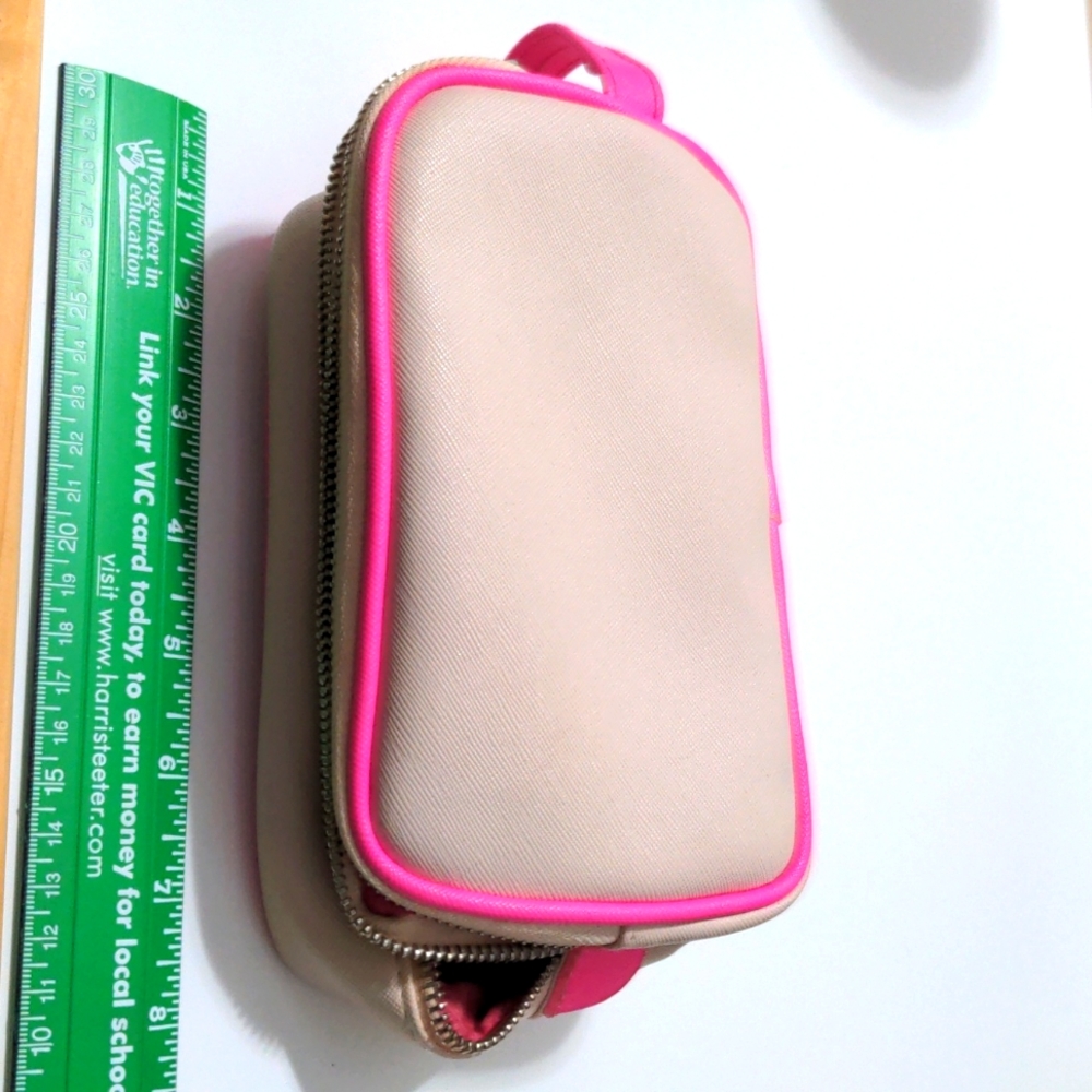 Beige and hot pink makeup bag